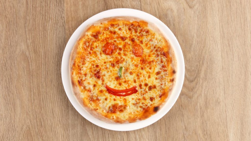 Pizza drôle de visage pour enfants